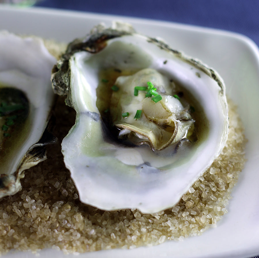 Grilled Oysters with Bourbon Brown Butter and Soy Sauce Vinaigrette