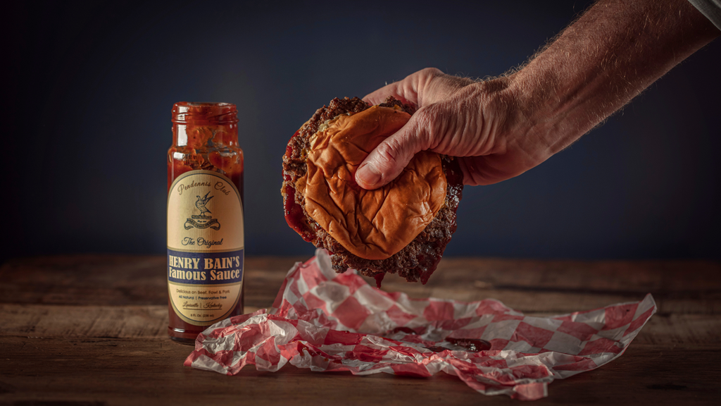 Henry Bains Famous Sauce spotlight with a smash burger