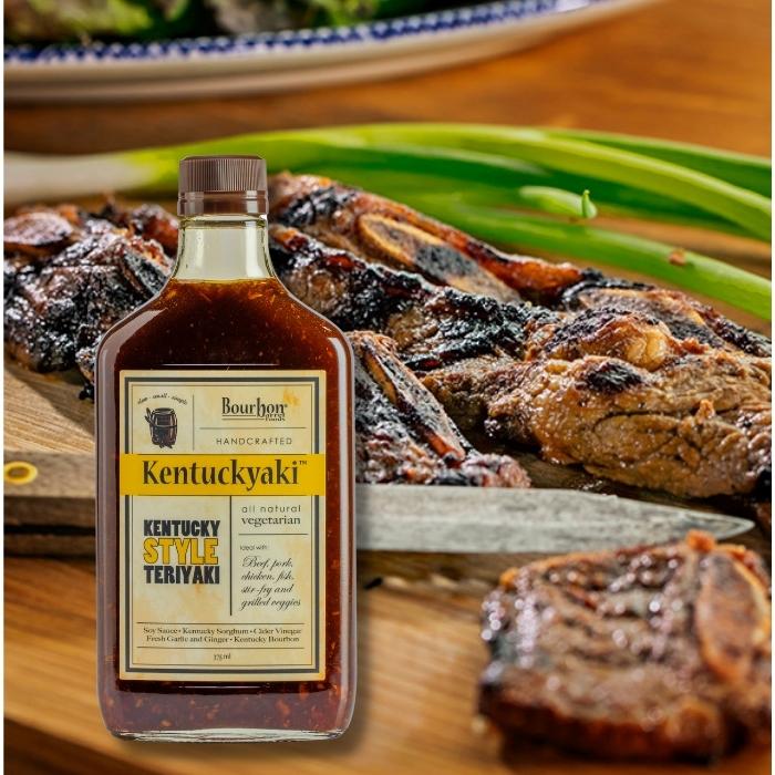 Kentuckyaki Sauce in front of a meal.