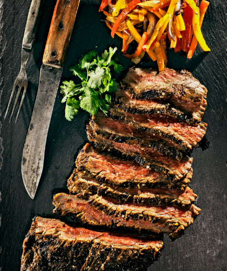 Adobo Flank Steak with Peppers and Onions