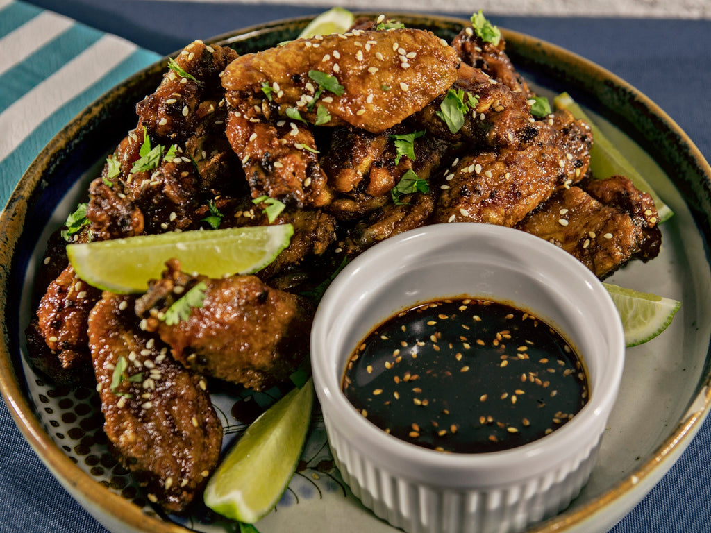 Crispy Sorghum, Sriracha and Lime Wings