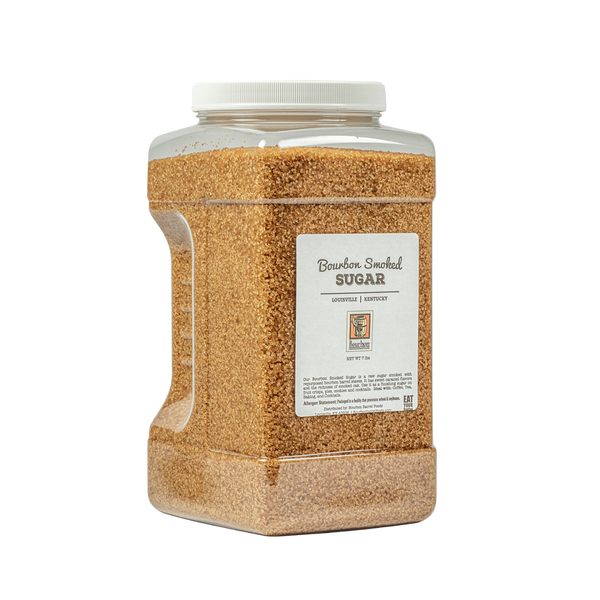 tub of bourbon smoked sugar on a white background