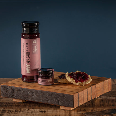 Bourbon Barrel Foods Black Raspberry Jam sizes with biscuit spread.