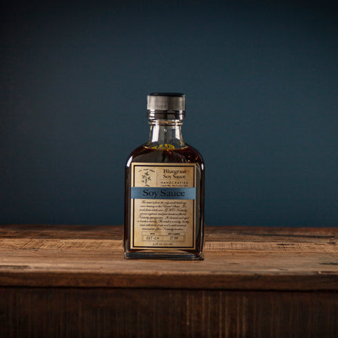 Bourbon Barrel Foods Bourbon Barrel Aged Bluegrass Soy Sauce blue background