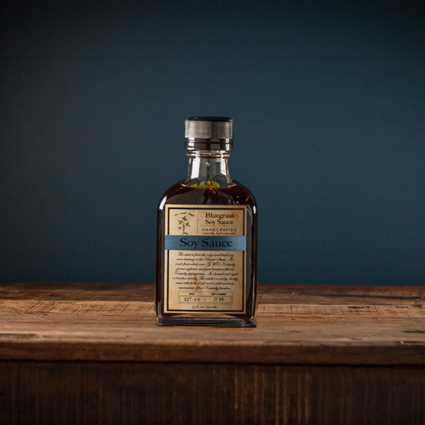 Bourbon Barrel Foods Bourbon Barrel Aged Bluegrass Soy Sauce blue background
