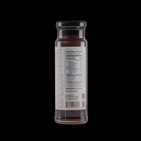 Bourbon Barrel Foods Bourbon Barrel Aged Sorghum with nutrition facts on back of bottle.