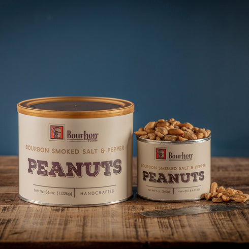 Bourbon Barrel Foods Bourbon Smoked Salt & Pepper Peanuts opened and closed.