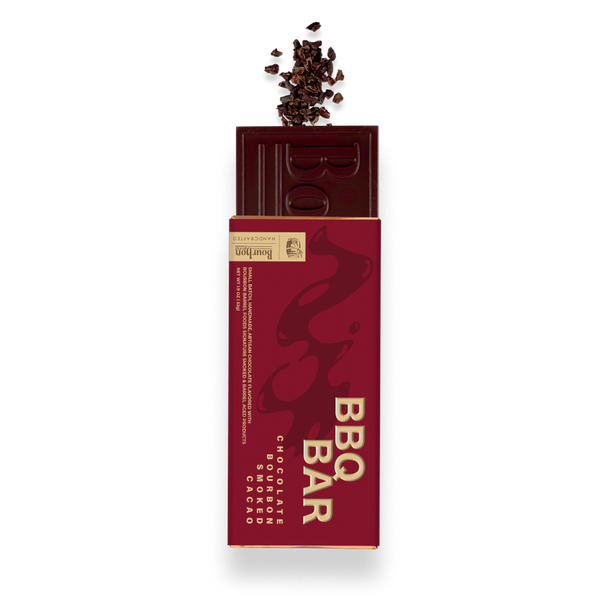 A chocolate bar in its packaging, shown upright on a plain white background. The wrapper is deep red with gold lettering that reads 'BBQ BAR' and 'CHOCOLATE BOND'.
