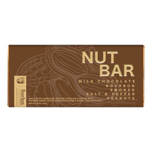 A rectangular box of Nut Bar Milk Chocolate Bourbon Smoked Salt & Pepper Peanuts on a plain white background.