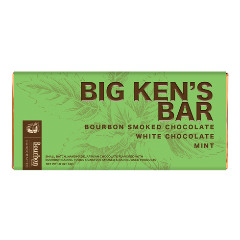 A boxed Big Ken's Bar chocolate on a plain white background. The package is light green with dark brown text reading 'BIG KEN'S BAR' and smaller text indicating bourbon smoked chocolate, white chocolate, and mint flavor.
