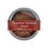 A round metal tin of Bourbon Smoked Sugar with a reddish-brown label, shown on a plain white background.