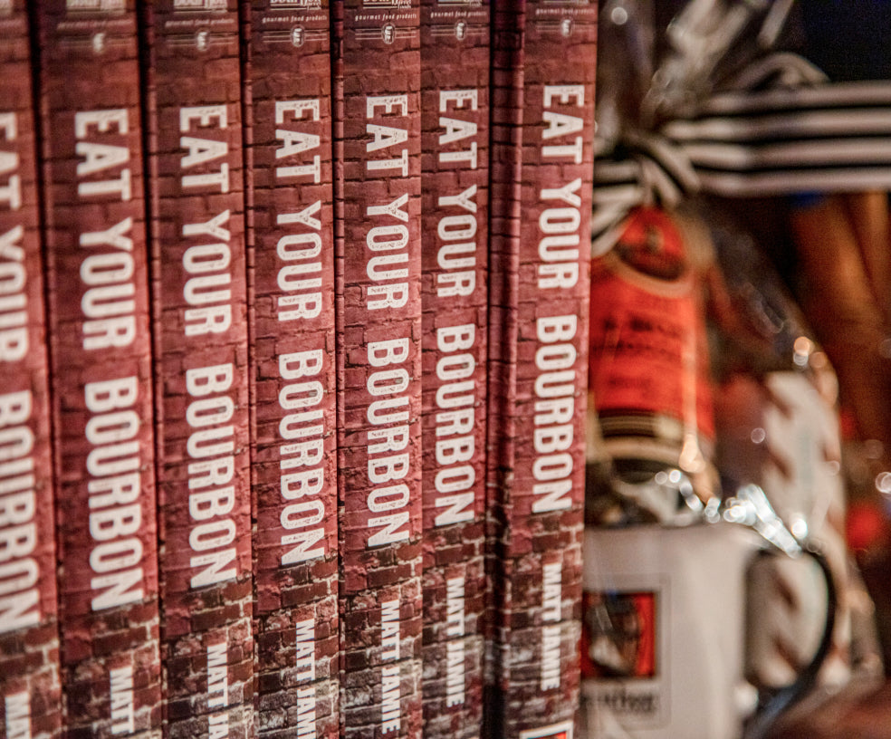 A line of Eat Your Bourbon cookbooks