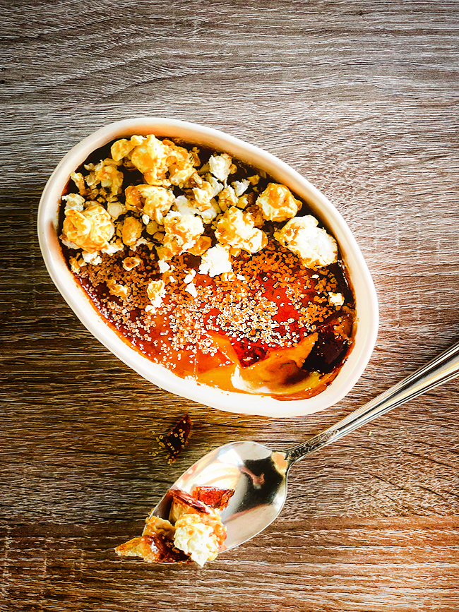 Overhead photo of Bourbon Barrel Creme Brulee with spoon