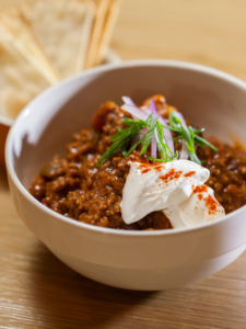 This bison chili recipe is sure to be a hit with all who try it. The rich bison meat pairs perfectly with the smoky bourbon spices, creating a delicious flavor that will warm you up from the inside out. Enjoy!