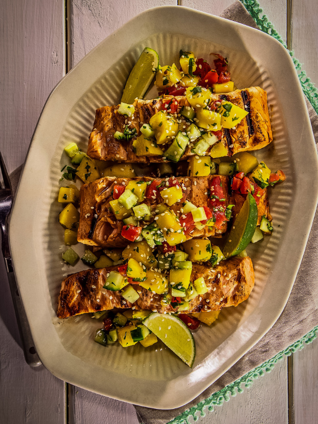 Bourbon Barrel Foods Salmon with Mango Salsa recipe picture served in a while serving platter.