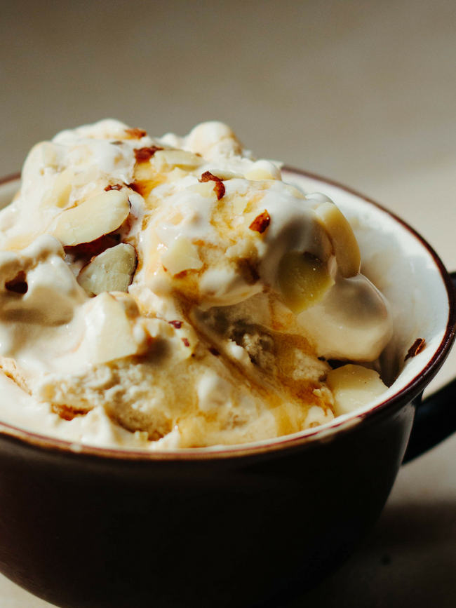 Bowl of Ice Cream with Caramel Sauce and nuts
