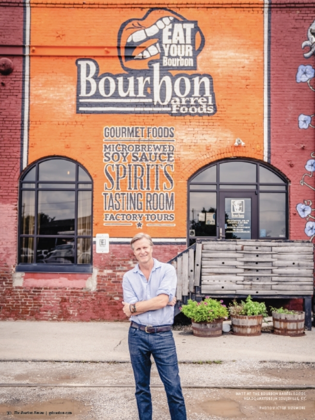 A photo of Matt Jamie in the front entrance of Bourbon Barrel Foods