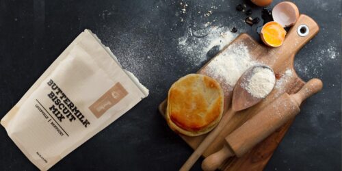 Buttermilk Biscuit Mix is handcrafted, artisan gourmet - biscuit on a board and baking process lifestyle shot.