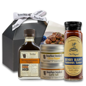 Bourbon Barrel Foods Henry Bain's Meatball Recipe Gift Box containing of Bourbon Barrel Aged Worcestershire, Henry Bains Sauce, Bourbon Smoked Citrus Pepper and Bourbon Smoked Garlic Salt with the Henry Bain's Meatballs recipe.